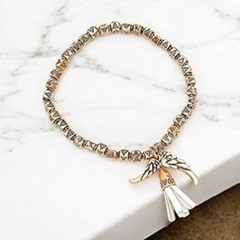Faux suede tassel & wing charm aztec metal bead stretch bracelet