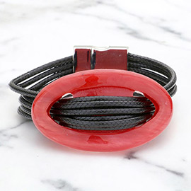 Celluloid hoop accented multi-tier cord bracelet